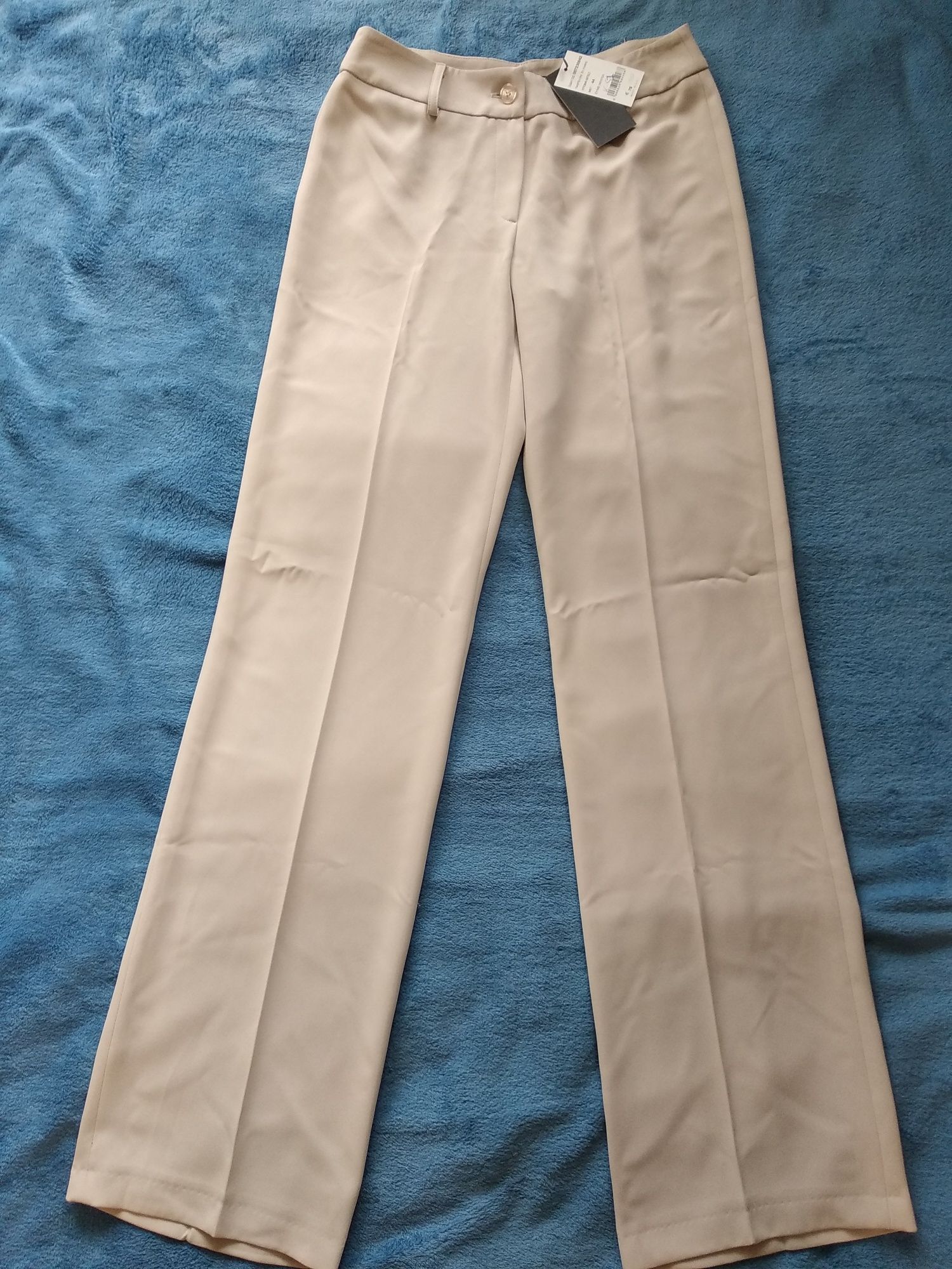 Продам новые брюки 44р