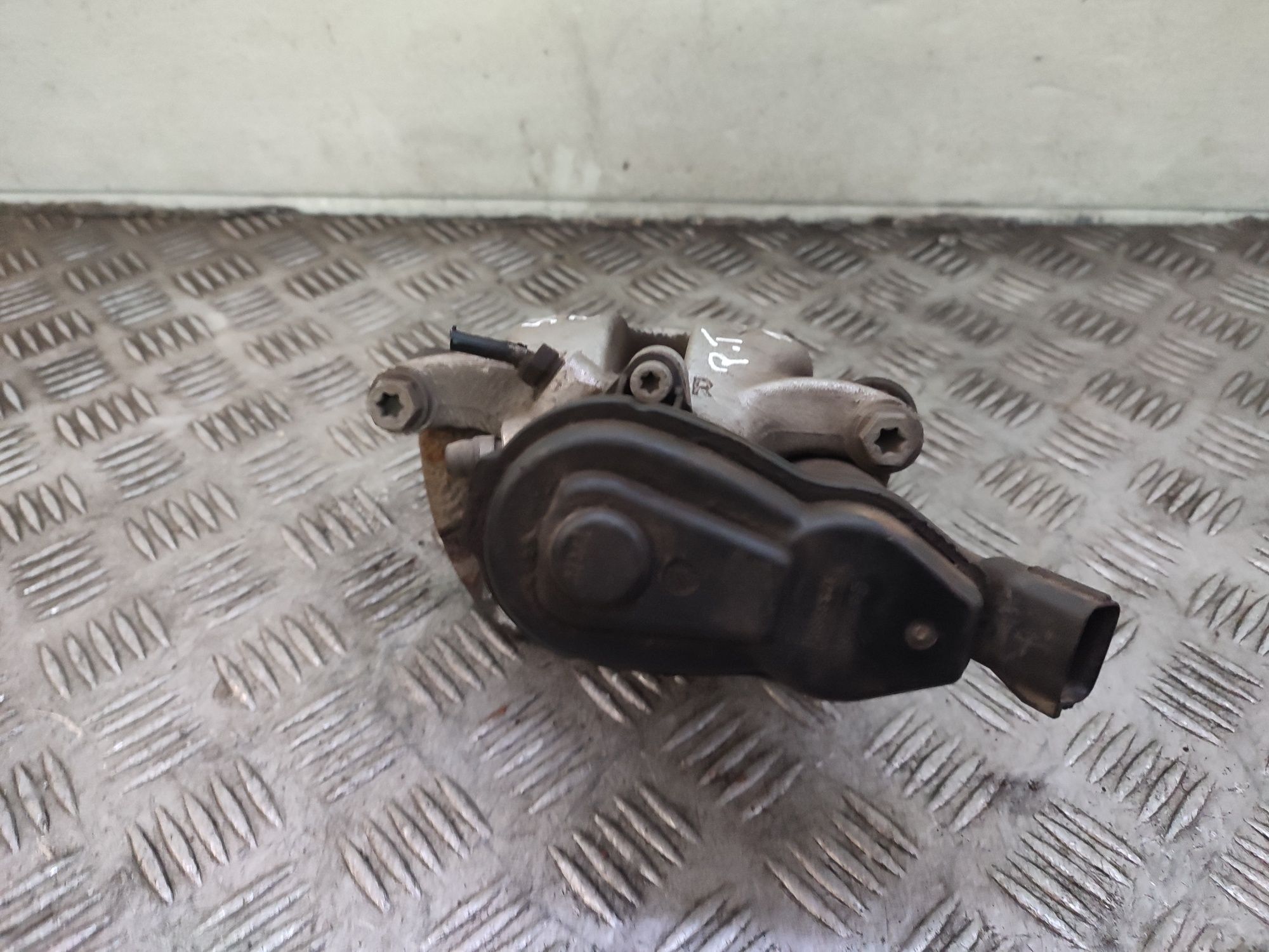 Renault Scenic III zacisk hamulcowy prawy tył tylny