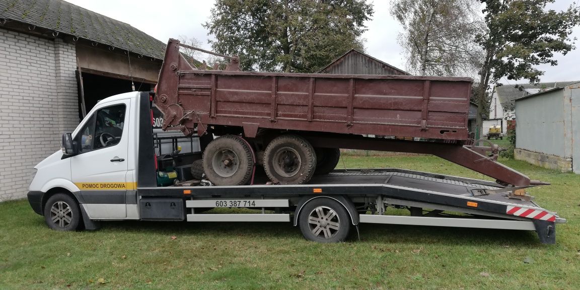 Przewóz Pojazdów Maszyn Autolaweta Laweta Pomoc Drogowa Polska UE