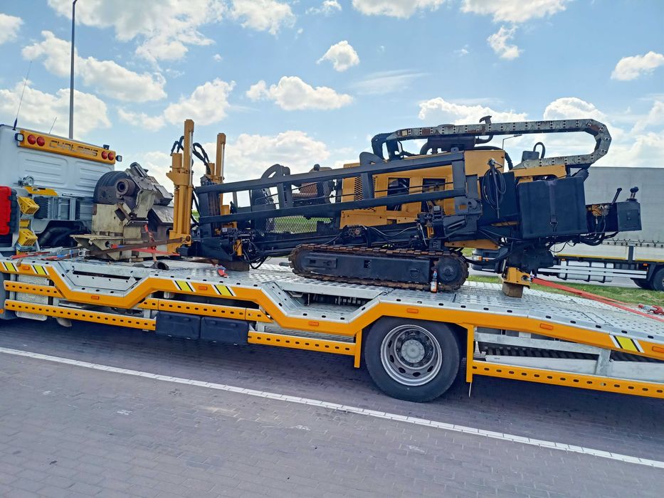 Pomoc drogowa transport maszyn  laweta autolaweta usługi transportowe