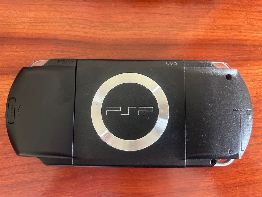 PsP com capa e carregador