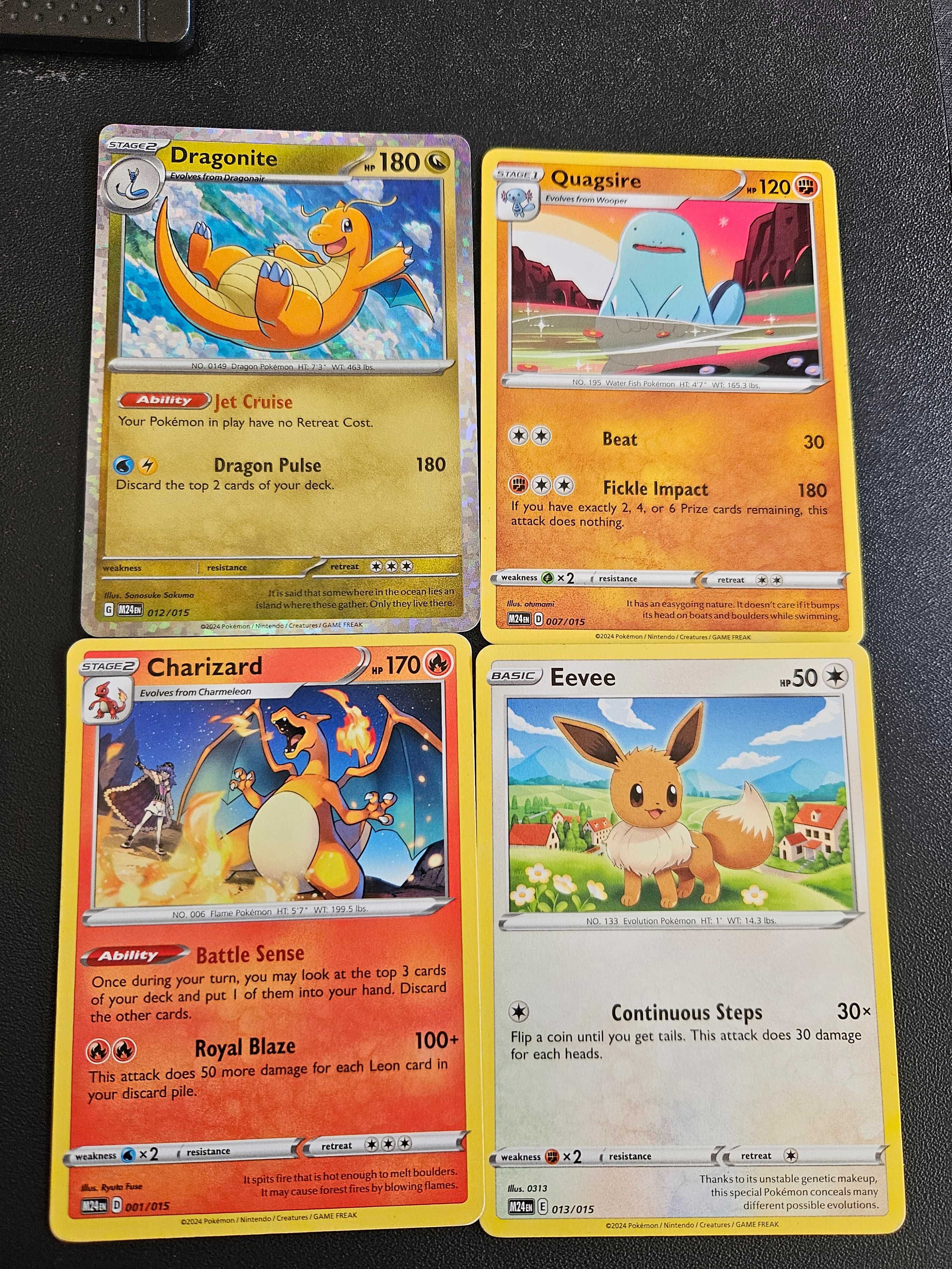 4 cartas Pokémon em estado impecável