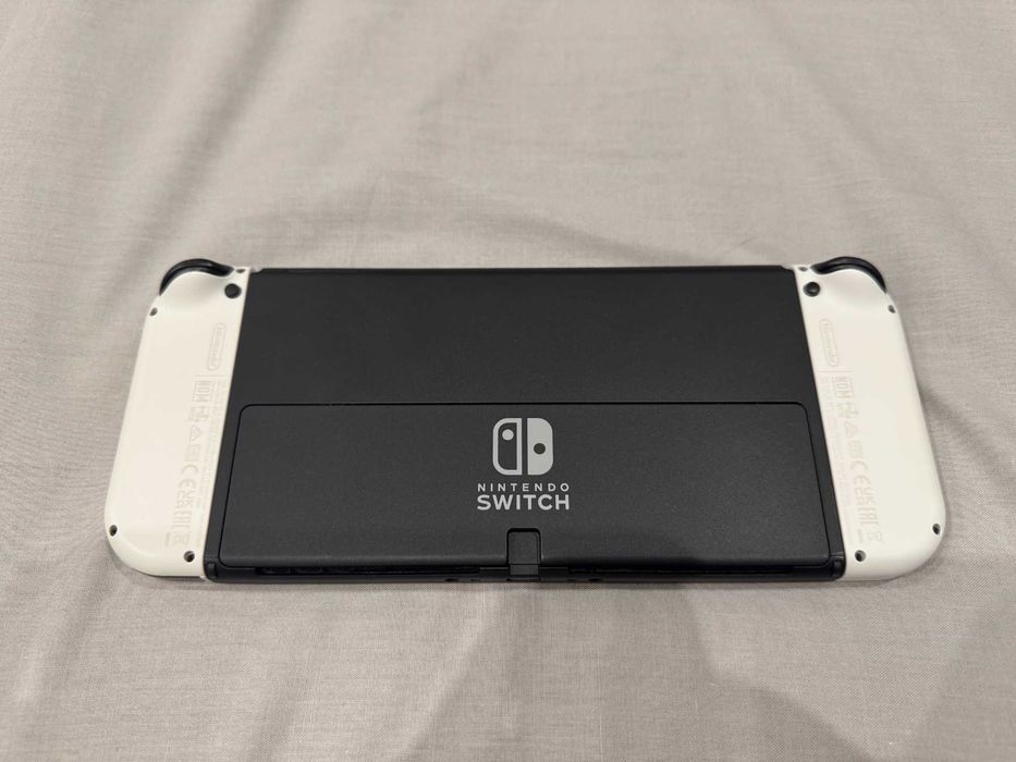 Nintendo Switch OLED with White Joy-Con + Legend of Zelda BOTW