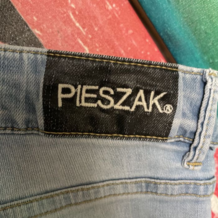 Spodnie jeansowe z dziurami Pieszak [27]