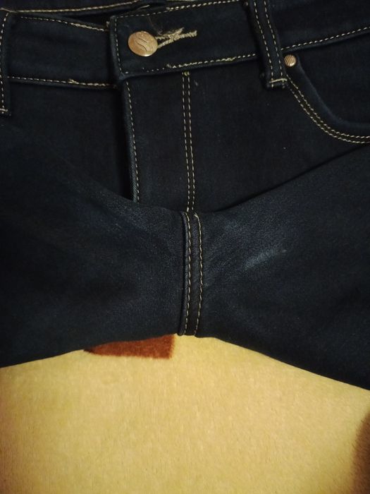 Джинсы теплые . .