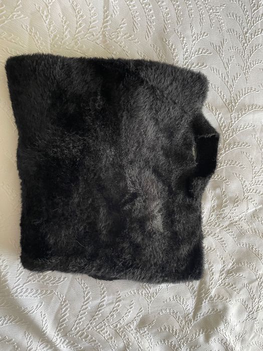 Camisolas e porta moedas