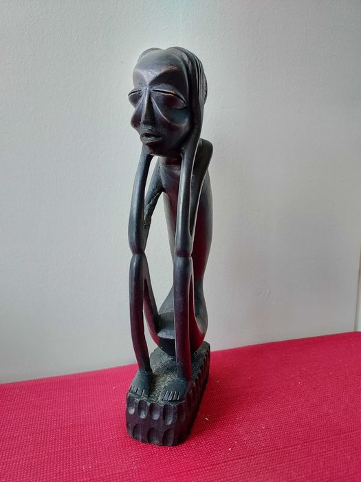 Bustos de Casal Africano em madeira nobre.