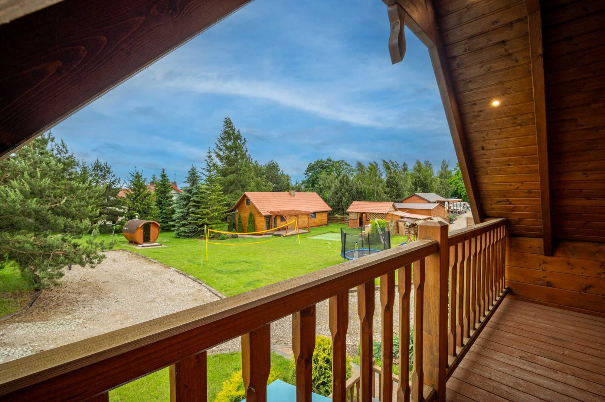 Domek 3 Mazury jacuzzi sauna łódka pomost quady