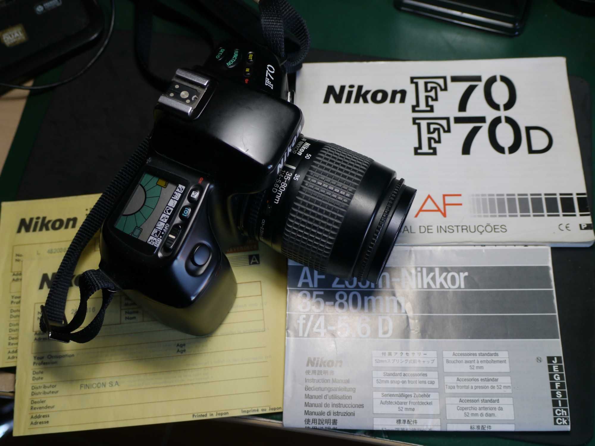 Conjunto Nikon AF camera e lente com manuais