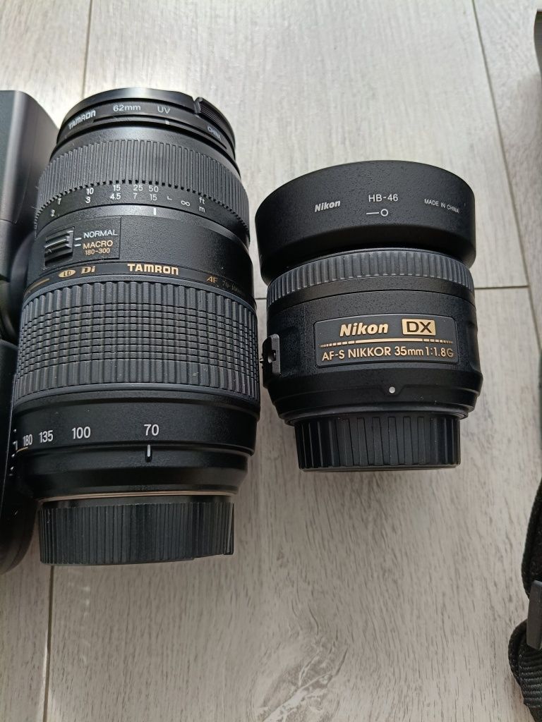 Nikon D5100 plus lampa błyskowa plus trzy obiektywy