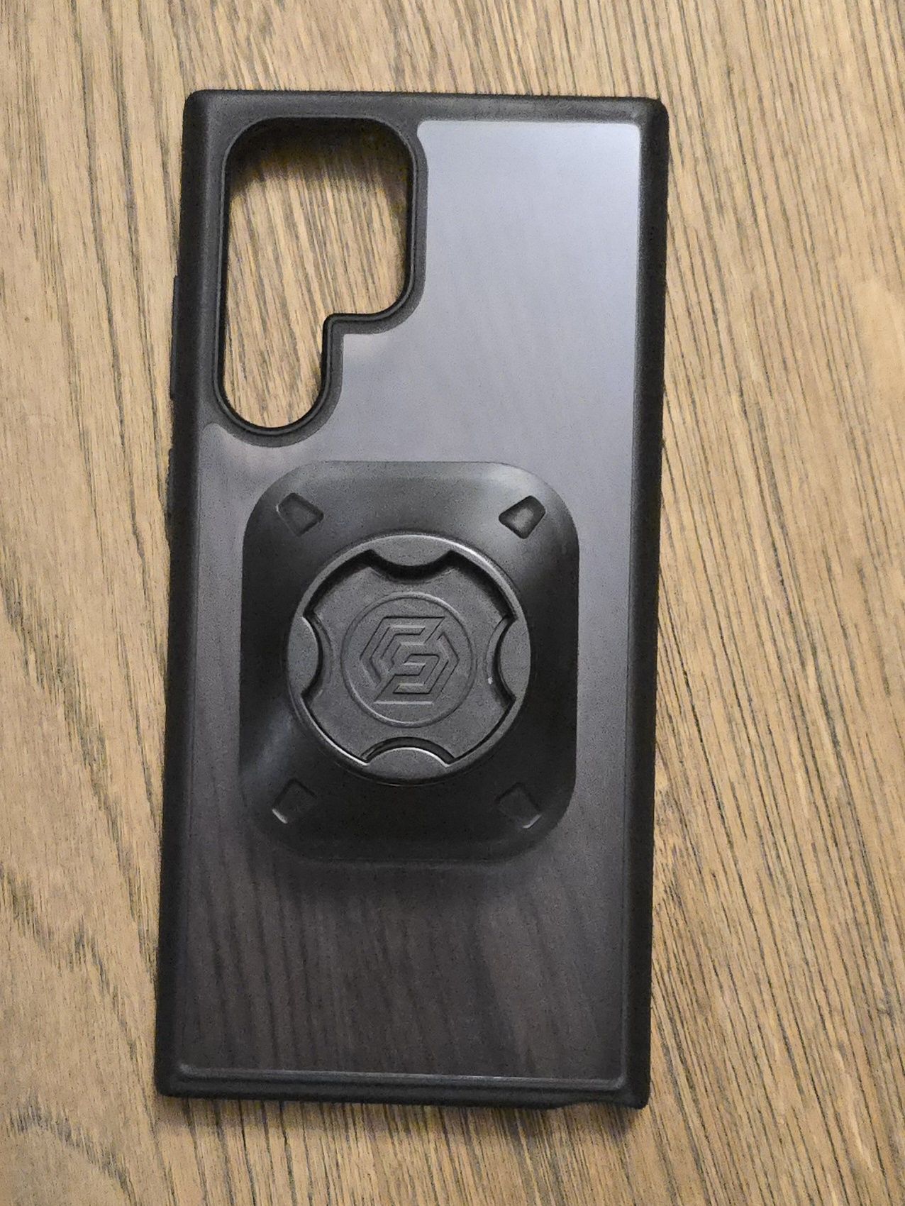 Uchwyt Spigen Gearlock MF100 + etui Spigen Galaxy S22 Ultra