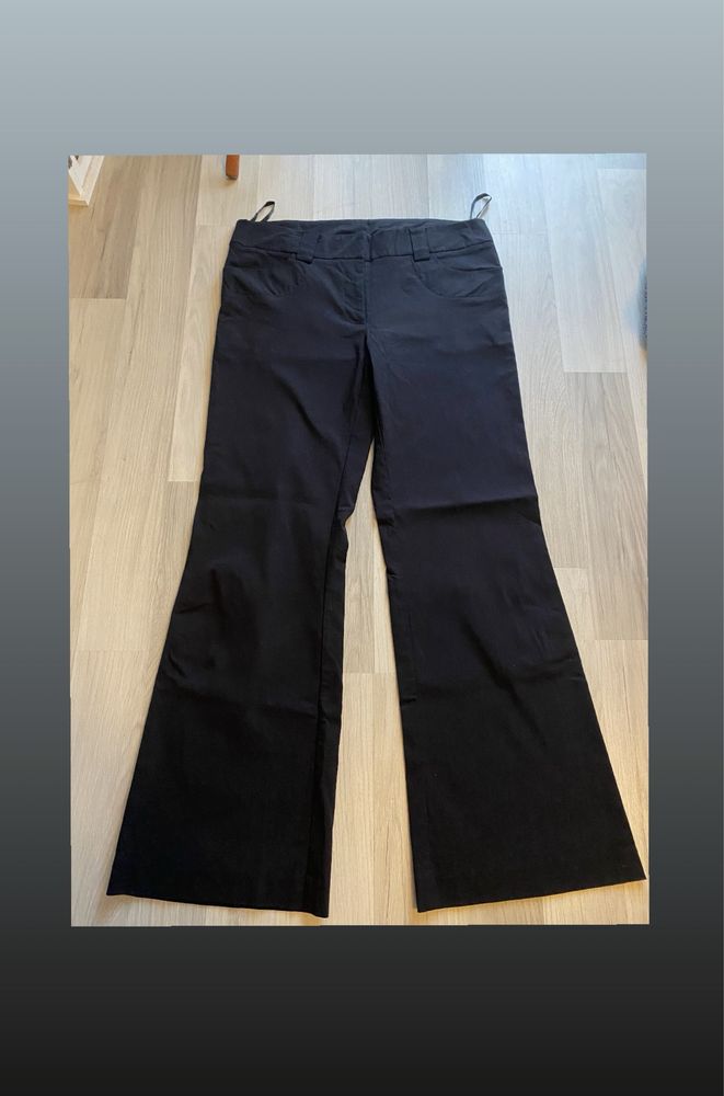 Czarne elegandzkie spodnie na kant L/40