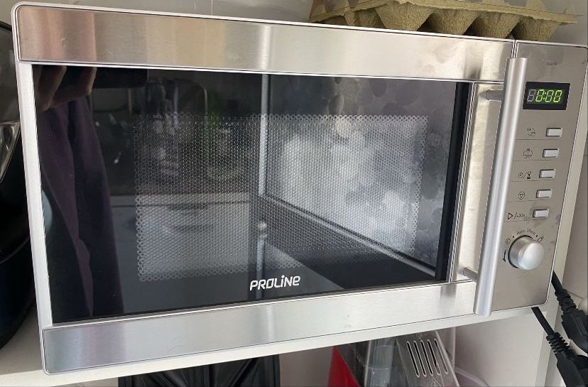 Microondas novo com garanta: Inox digital com função forno grill 1000W