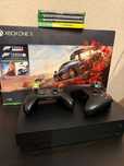 Xbox One X 1TB + 2 pady + 4 gry + HDMI