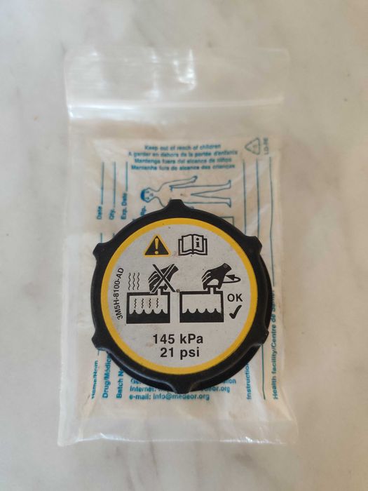 Крышка бачка охлаждающей жидкости Мазда, Форд, Вольво. (Оригинал)