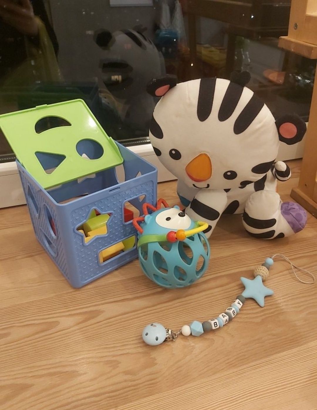 Zabawki niemowlęce fisher price zebra skip Hop jeżyk sorter klocki