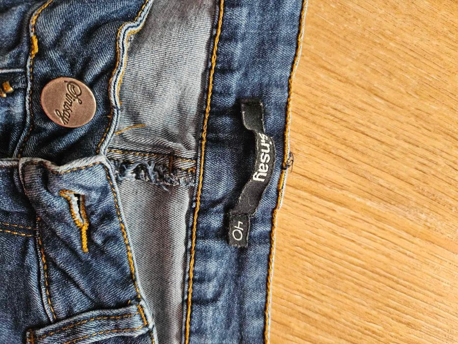 Spodnie jeansowe Sinsay 40