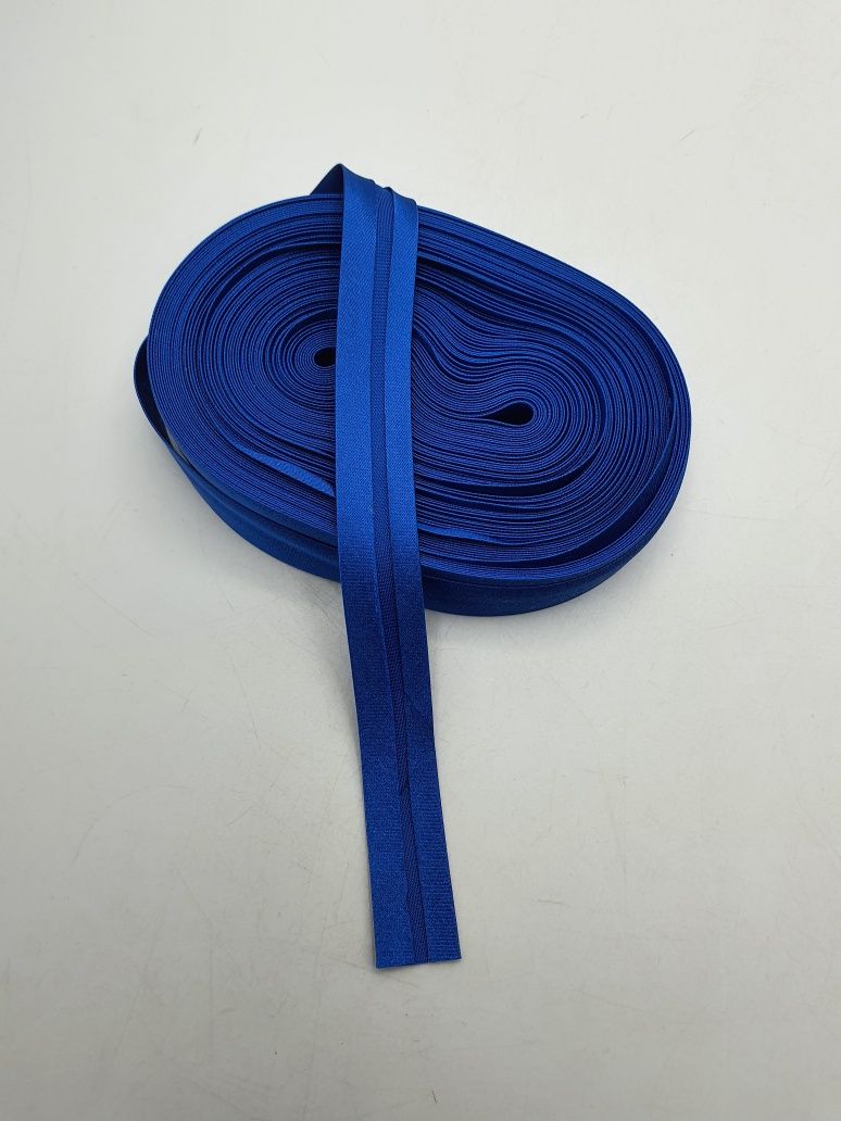 Lamówka zaprasowana atłas kupon 15 m.x 14 mm.modrak