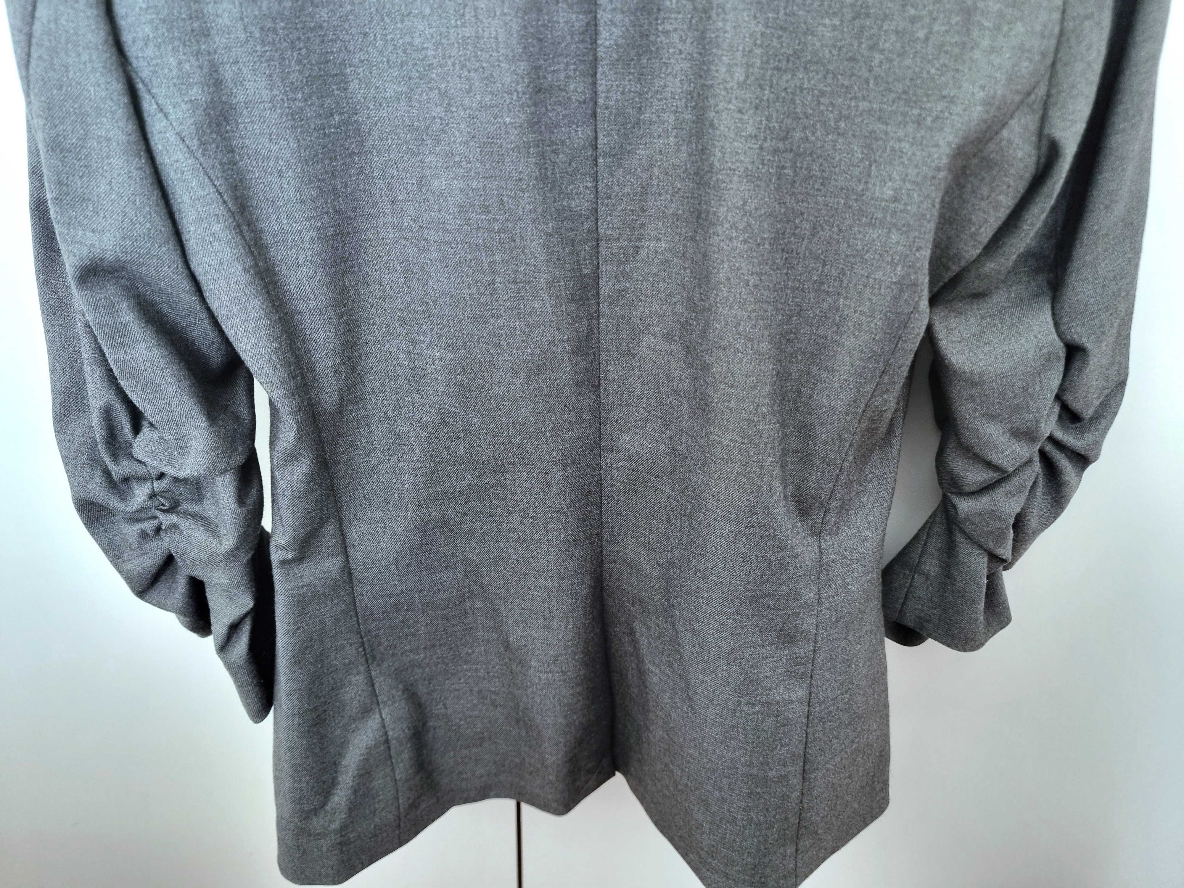 Blazer cinzento com efeito de mangas arregaçadas H&M, tamanho 34