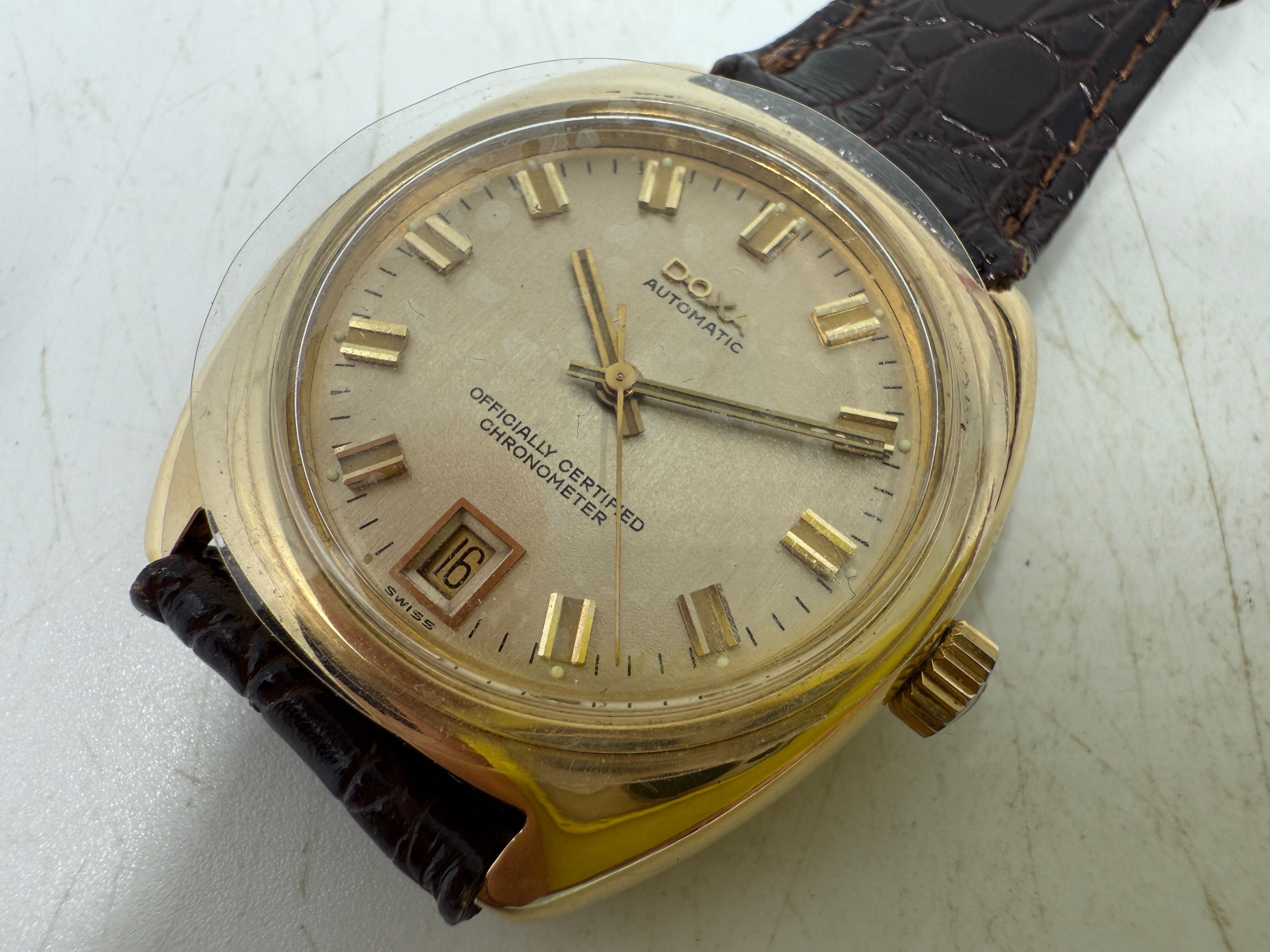 Złoty zegarek Doxa automatic złoto próba 750