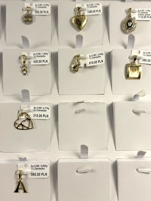 Złota zawieszka z turkusem