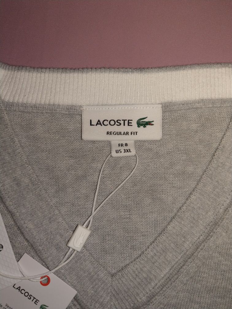 Swetr męski marki Lacoste. Roz.3-XL