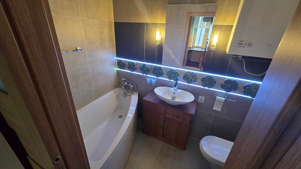 Przytulne mieszkanie z działką i garażem  – gotowe do zamieszkania!