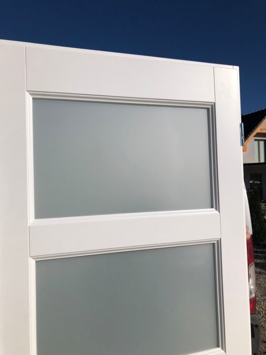 Drzwi wewnętrzne  drewniane dwuskrzydłowe z naświetlem Cała Polska