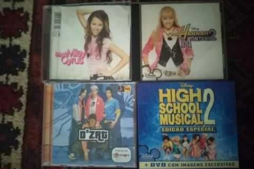 CDs música (pink, hanna montana, miley cyrus, d'zrt)