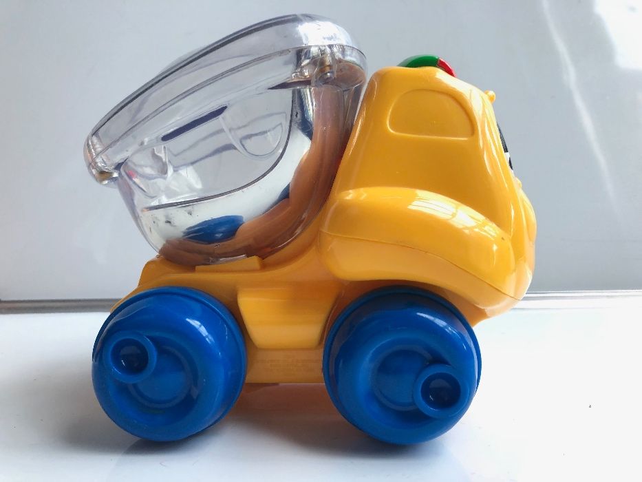 Samochodzik FISHER PRICE z kulkami, Ciężarówka CAT dźwięk i światło