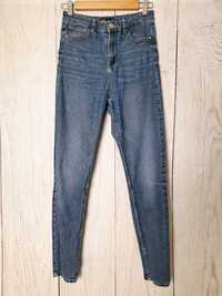 Niebieskie spodnie damskie dżinsy jeans z wysokim stanem Sinsay S 36