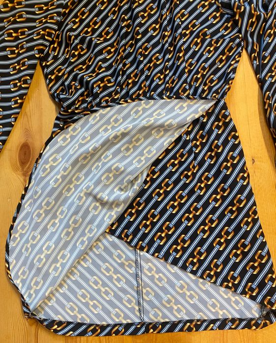 Sukienka Imperial stójka bufiasty długi rękaw glamour awangardowa