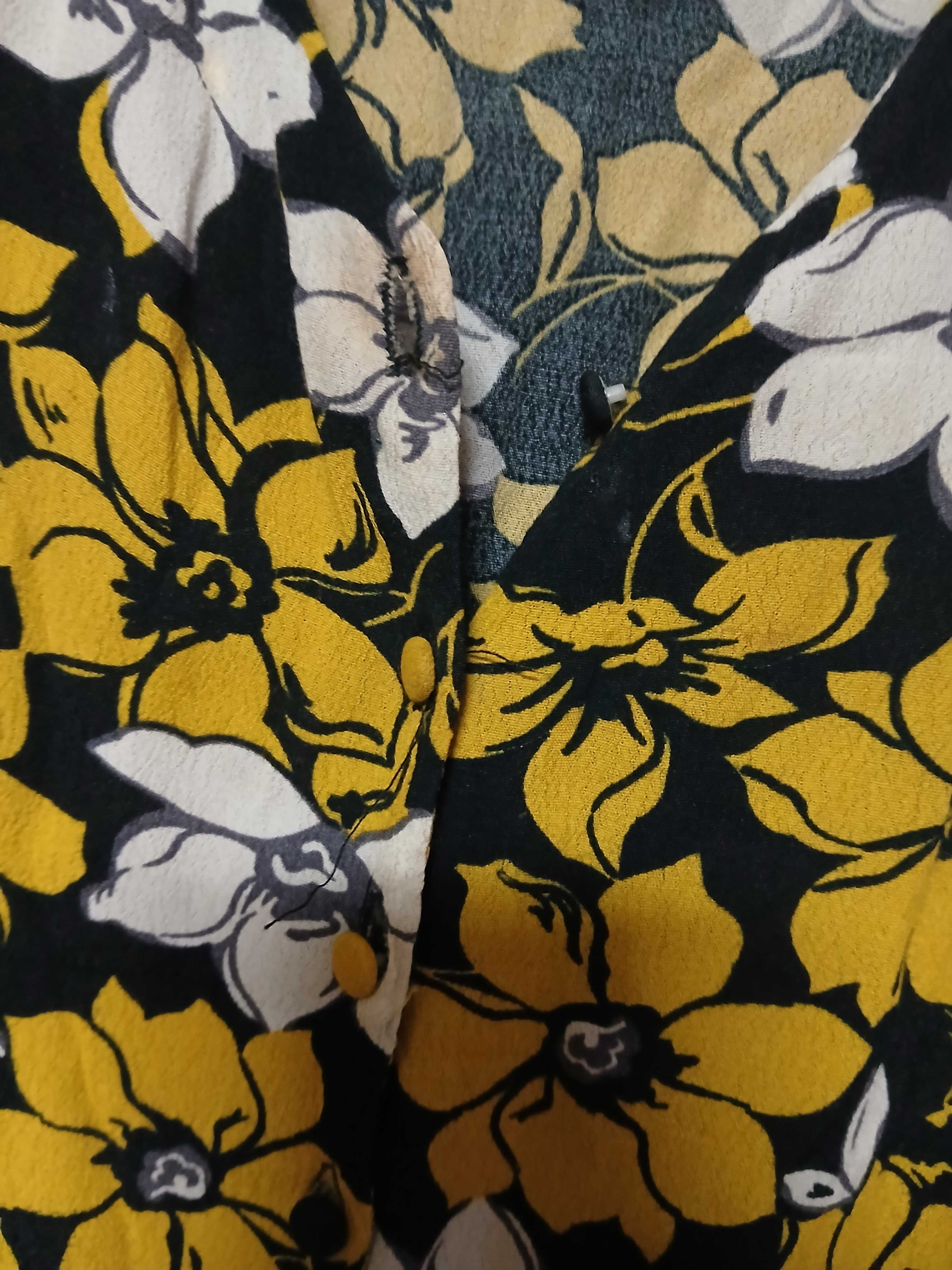 Vestido pelo joelho e com manga comprida, da Mango