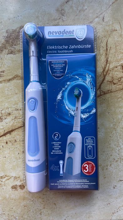 Elektryczna  szczoteczka  do  zębów  -  nowa