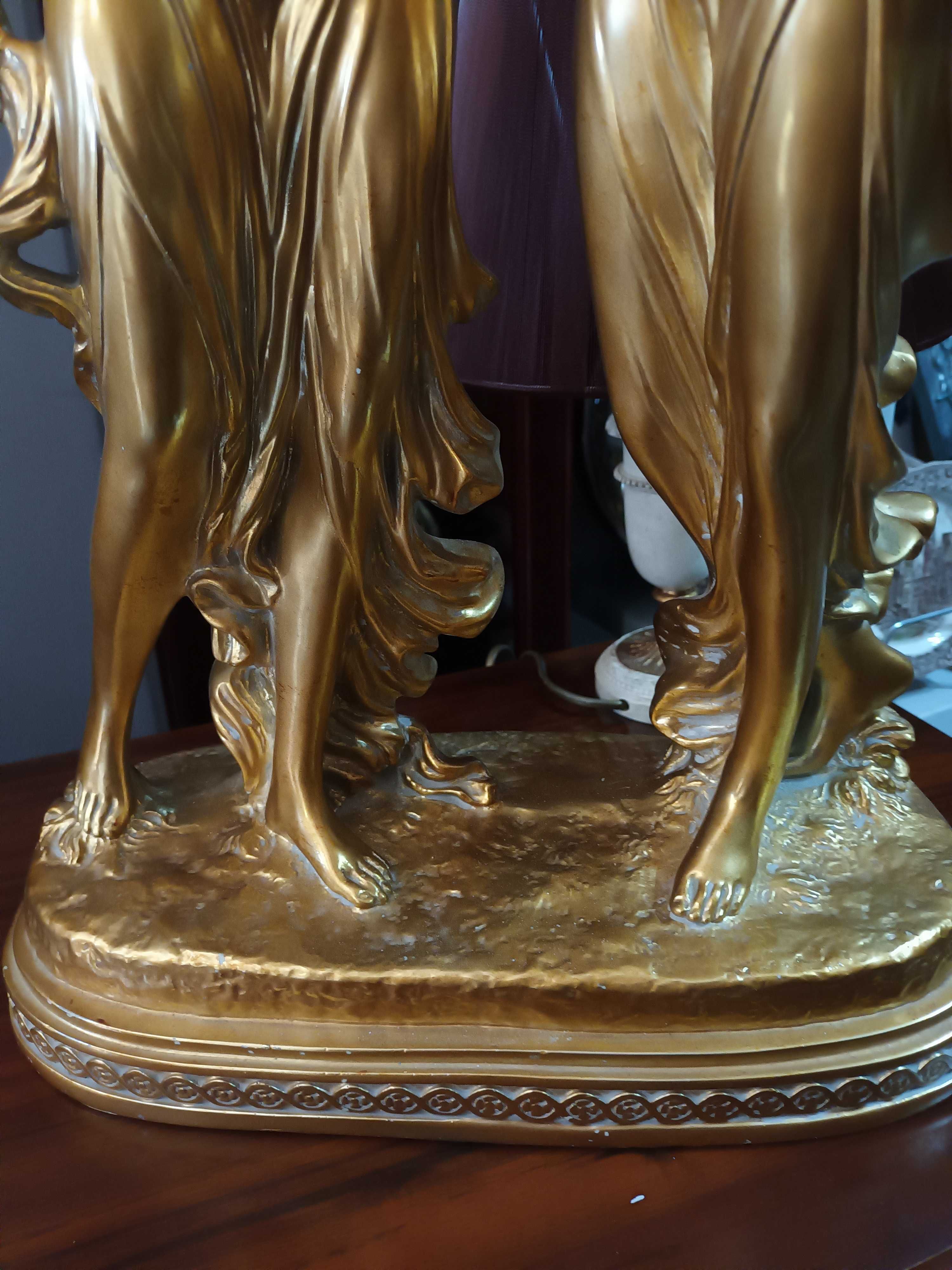 Escultura em dourado castiçal