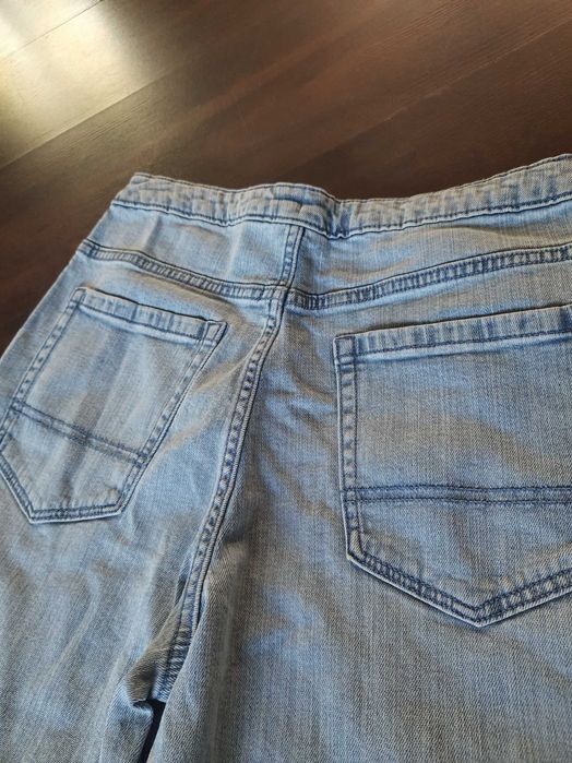 Dwie pary spodni jeansów marki H&M oraz Pepperts r. 158