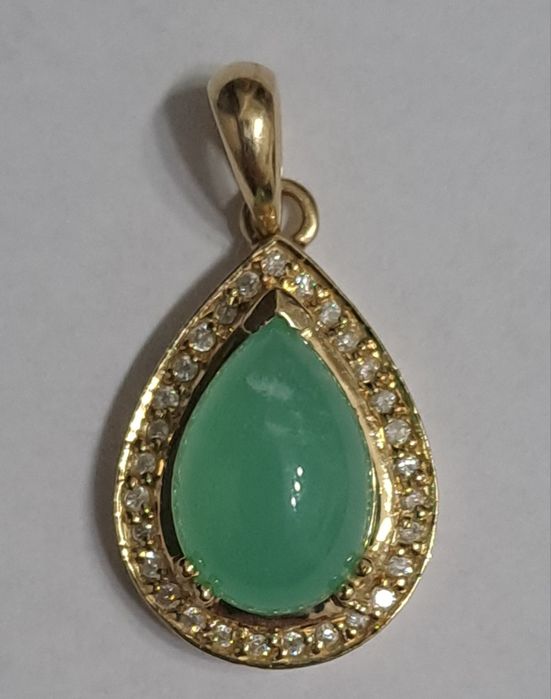 Zawieszka złota zbrylantami.