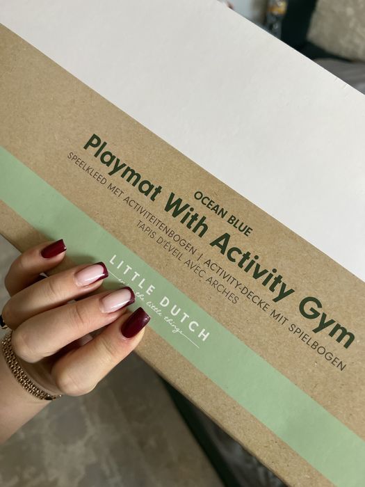 Килим для малюка в формі ракушки