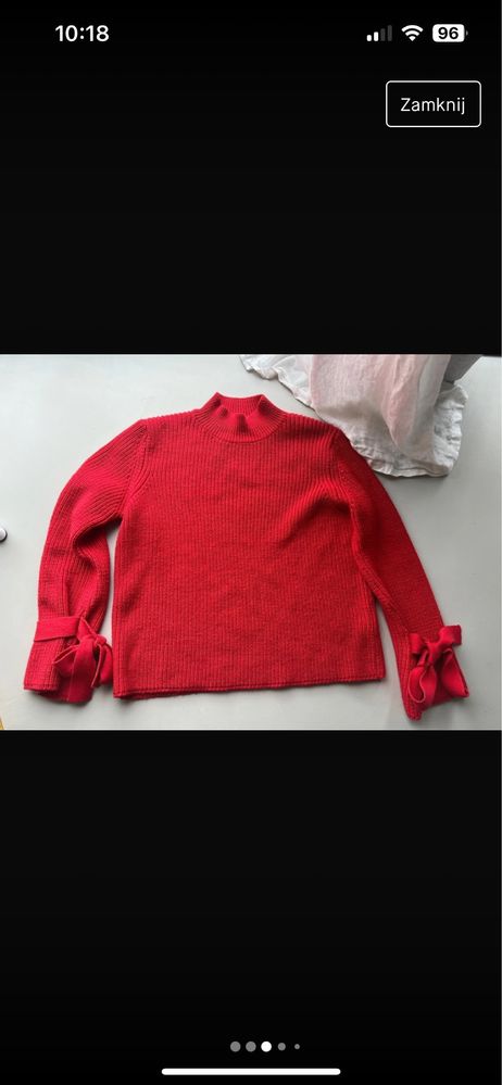 Czerwony, ciepły sweter na jesień-zimę