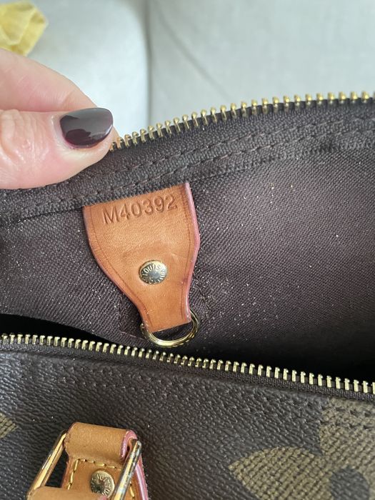 Mala e carteira em bom estado