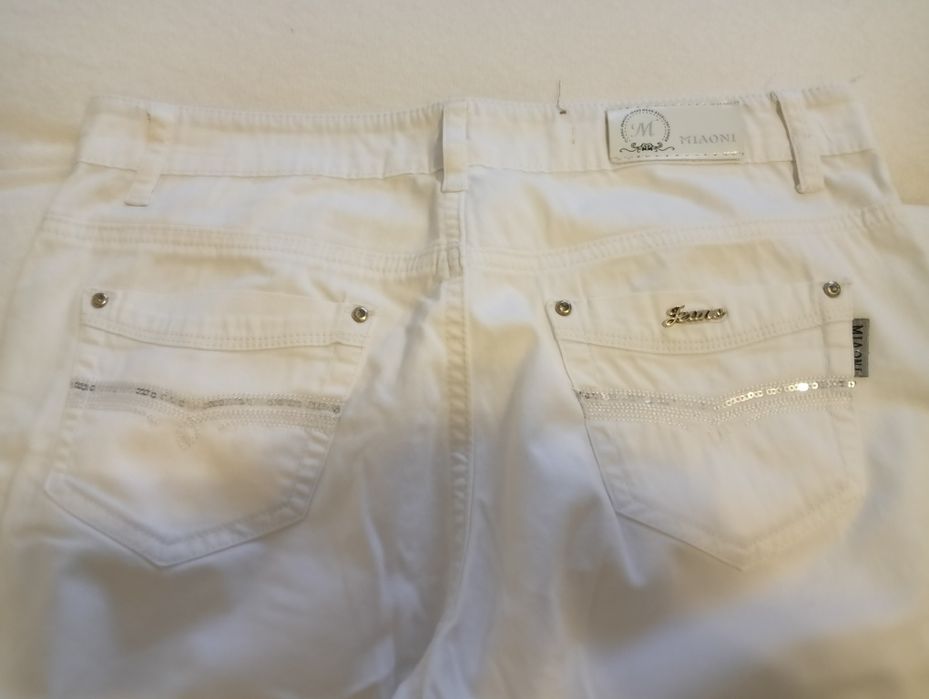 Białe spodnie rozm 42/44
