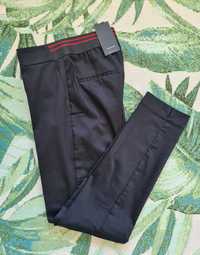 Reserved eleganckie spodnie materiałowe na kant 38 M