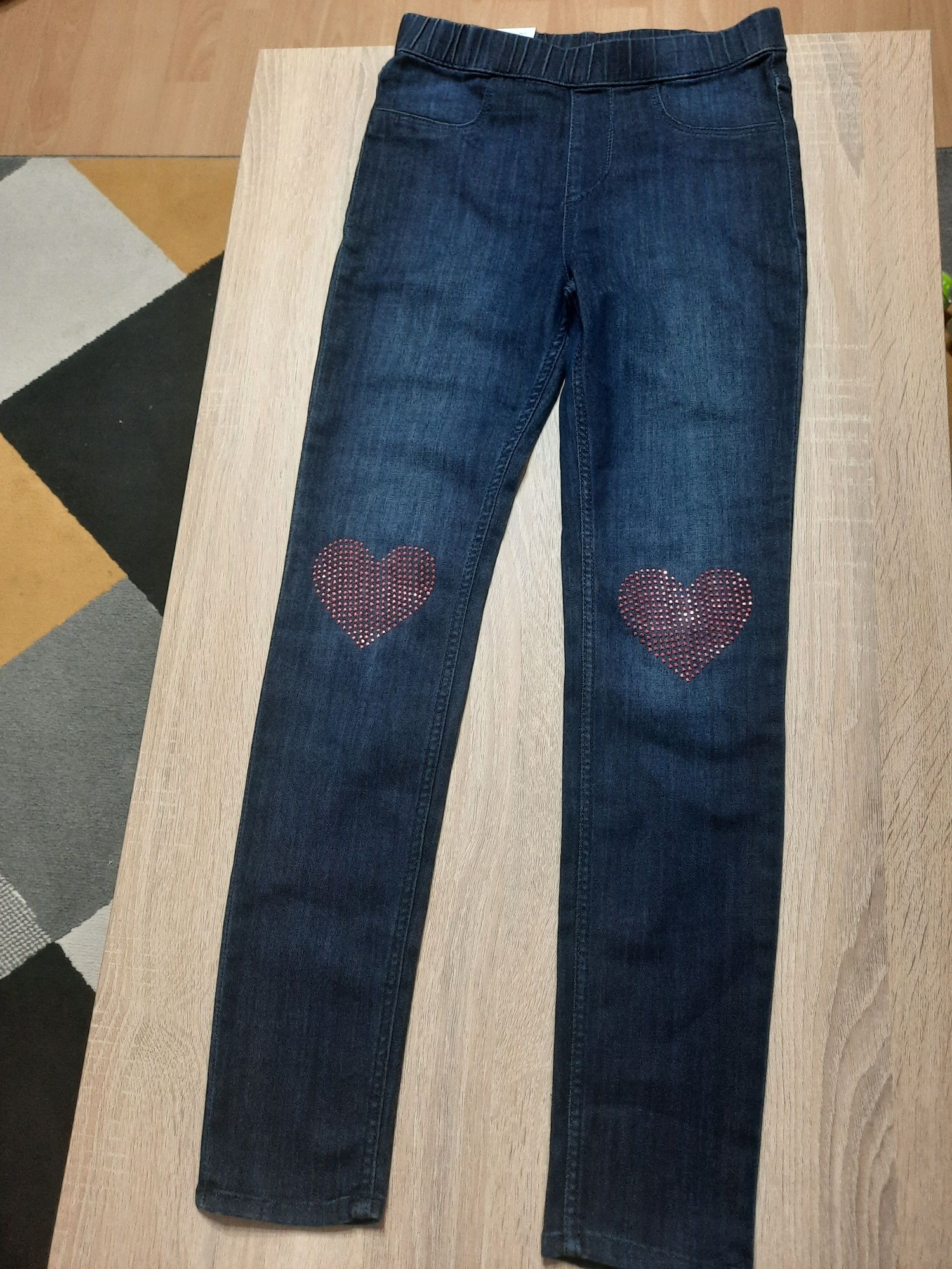 Nowe spodnie jeans, leginsy H&M,  rozm. 134 z cekinami