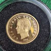 Золотая монета 1.24