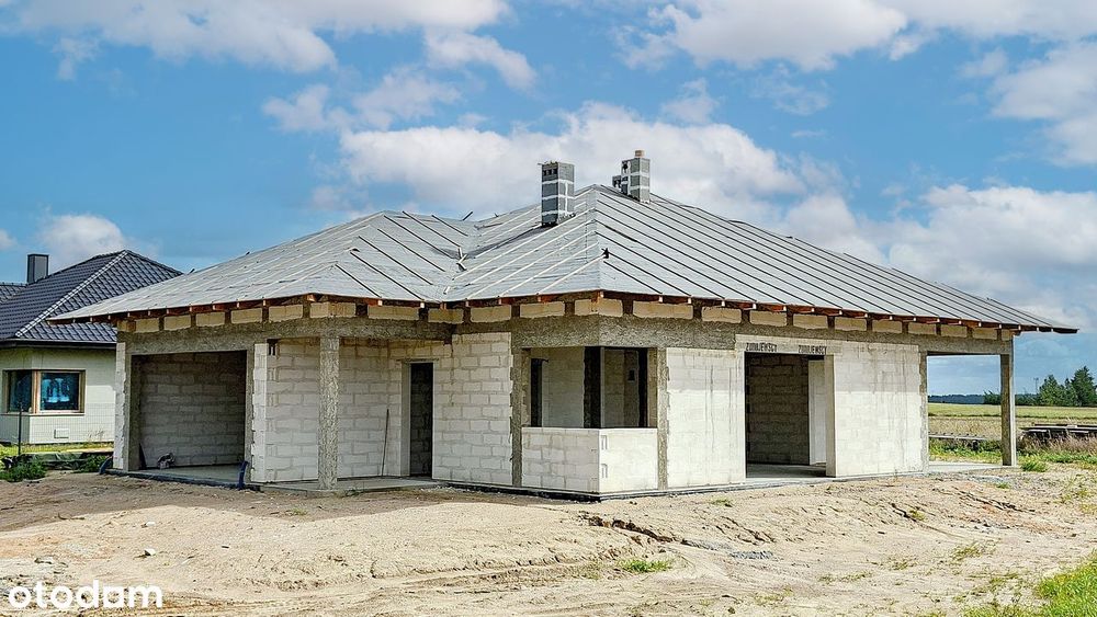 Nowoczesny dom parterowy (stan surowy) z działką 1000 mkw w Żukowie