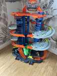 Zestaw Mattel Hot Wheels City GJL14 Mega Garaż Atak Dinozaura T-Rex