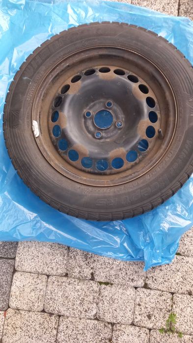 Felgi stalowe z oponami zimowymi opel corsa używane