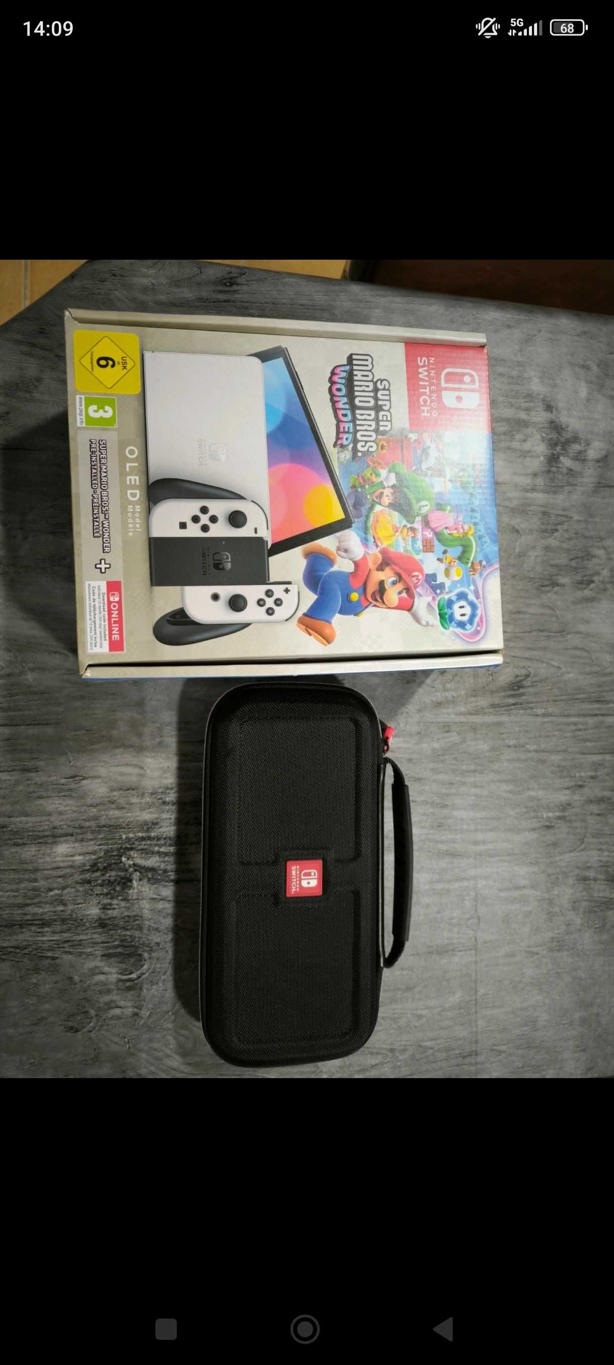 Nintendo Switch OLED Version (Super Mario Wonder + FC25)