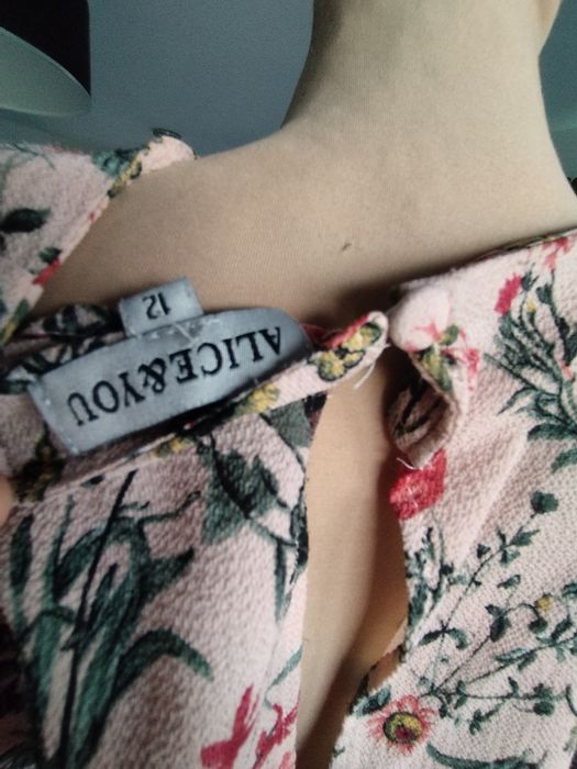 R.40 bluzka dłuższy tył w kwiaty