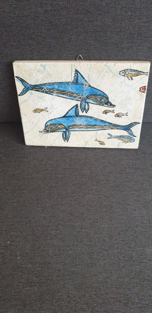 Obrazek z delfinami
